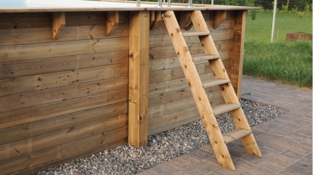 Piscine en bois 8.57x4.57 - H.1.31 m fixations à visser